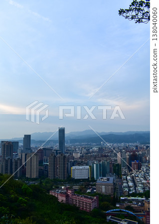 Aerial view of skyline of Taipei city at sunset from Xiangshan Elephant Mountain with colorful sky. Beautiful landscape and cityscape of Taipei downtown buildings and architecture in the city Aerial view of skyline of Taipei city at sunset from Xiangshan Elephant Mountain with colorful sky. Beautiful landscape and cityscape of Taipei downtown buildings and architecture in the city 138040060