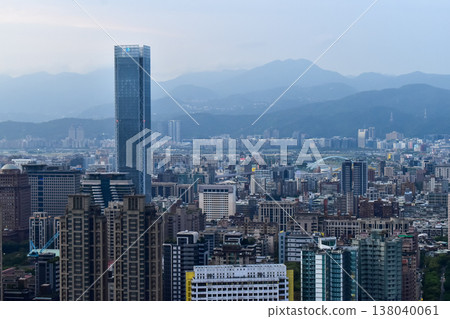 Aerial view of skyline of Taipei city at sunset from Xiangshan Elephant Mountain with colorful sky. Beautiful landscape and cityscape of Taipei downtown buildings and architecture in the city 138040061