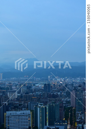 Aerial view of skyline of Taipei city at sunset from Xiangshan Elephant Mountain with colorful sky. Beautiful landscape and cityscape of Taipei downtown buildings and architecture in the city Aerial view of skyline of Taipei city at sunset from Xiangshan Elephant Mountain with colorful sky. Beautiful landscape and cityscape of Taipei downtown buildings and architecture in the city 138040065