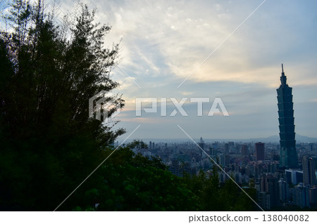 Aerial view of skyline of Taipei city with Taipei 101 Skyscraper at sunset from Xiangshan Elephant Mountain. Beautiful landscape and cityscape of Taipei downtown buildings and architecture in the city Aerial view of skyline of Taipei city with Taipei 101 Skyscraper at sunset from Xiangshan Elephant Mountain. Beautiful landscape and cityscape of Taipei downtown buildings and architecture in the city 138040082