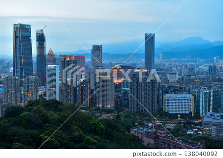 Aerial view of skyline of Taipei city at sunset from Xiangshan Elephant Mountain with colorful sky. Beautiful landscape and cityscape of Taipei downtown buildings and architecture in the city Aerial view of skyline of Taipei city at sunset from Xiangshan Elephant Mountain with colorful sky. Beautiful landscape and cityscape of Taipei downtown buildings and architecture in the city 138040092