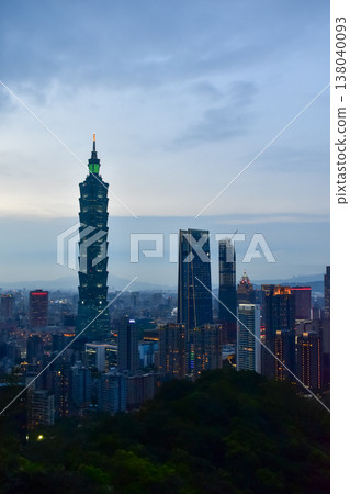 Aerial view of skyline of Taipei city with Taipei 101 Skyscraper at sunset from Xiangshan Elephant Mountain. Beautiful landscape and cityscape of Taipei downtown buildings and architecture in the city 138040093