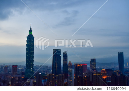 Aerial view of skyline of Taipei city with Taipei 101 Skyscraper at sunset from Xiangshan Elephant Mountain. Beautiful landscape and cityscape of Taipei downtown buildings and architecture in the city Aerial view of skyline of Taipei city with Taipei 101 Skyscraper at sunset from Xiangshan Elephant Mountain. Beautiful landscape and cityscape of Taipei downtown buildings and architecture in the city 138040094