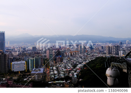 Aerial view of skyline of Taipei city at sunset from Xiangshan Elephant Mountain with colorful sky. Beautiful landscape and cityscape of Taipei downtown buildings and architecture in the city Aerial view of skyline of Taipei city at sunset from Xiangshan Elephant Mountain with colorful sky. Beautiful landscape and cityscape of Taipei downtown buildings and architecture in the city 138040096