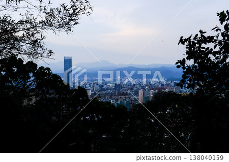 Aerial view of skyline of Taipei city at sunset from Xiangshan Elephant Mountain with colorful sky. Beautiful landscape and cityscape of Taipei downtown buildings and architecture in the city Aerial view of skyline of Taipei city at sunset from Xiangshan Elephant Mountain with colorful sky. Beautiful landscape and cityscape of Taipei downtown buildings and architecture in the city 138040159