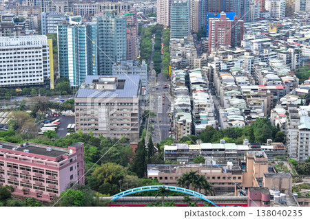 Aerial view of skyline of Taipei city at sunset from Xiangshan Elephant Mountain with colorful sky. Beautiful landscape and cityscape of Taipei downtown buildings and architecture in the city 138040235