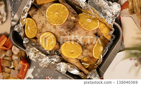 Roasted whole duck served with orange slices. Christmas dish Roasted whole duck served with orange slices. Christmas dish 138040369