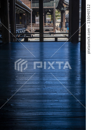 The wooden floorboards were polished until they gleamed. 138040512