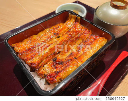 Unaju. Grilled eel served in a tiered bento box. Unaju. Grilled eel served in a tiered bento box. 138040627