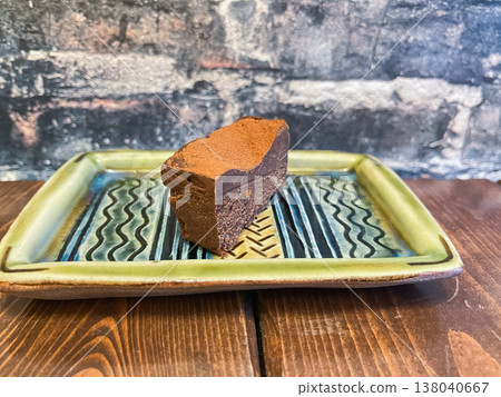 A cross-section of a gluten-free chocolate cake. A cross-section of a gluten-free chocolate cake. 138040667
