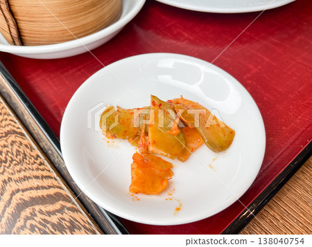 Zha cai is a spicy pickled vegetable with a kimchi flavor. Zha cai is a spicy pickled vegetable with a kimchi flavor. 138040754