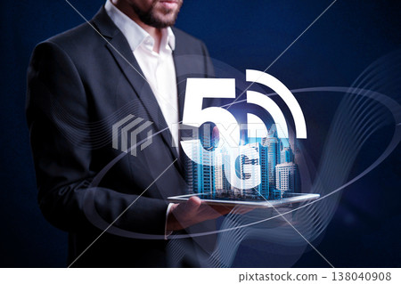 Holding a 5G symbol with city buildings in a futuristic setting at night 138040908