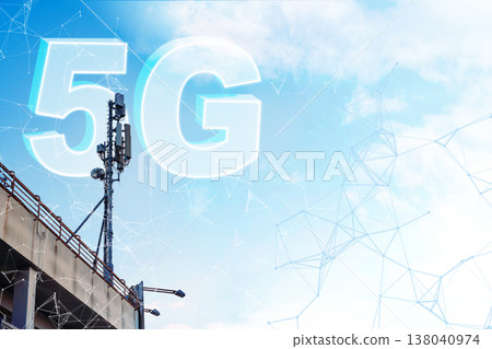 5G internet network tower stands tall against a blue sky with clouds 138040974