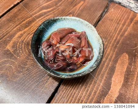 Firefly squid marinated in soy sauce. A famous dish from Toyama Prefecture, made by marinating firefly squid in soy sauce. 138041094