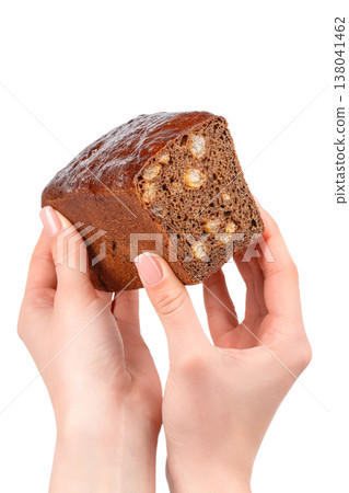 Bread Loaf with Walnut Crumb in Hands Isolated on White Background Bread Loaf with Walnut Crumb in Hands Isolated on White Background 138041462