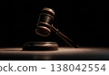 Wooden Gavel and Sound Block on Courtroom Bench Symbolizing Justice, Law, and Legal Authority 138042554