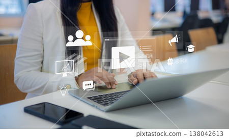 Video marketing strategy for business growth.online education and e-learning platform concept.digital content creation and video streaming service.businesswoman watching webinar on laptop computer. Video marketing strategy for business growth.online education and e-learning platform concept.digital content creation and video streaming service.businesswoman watching webinar on laptop computer. 138042613