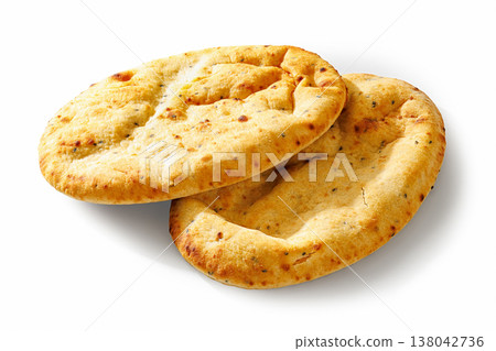 Two oval indian naan kulcha flatbreads top view 138042736