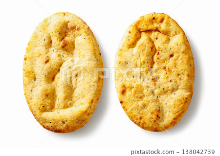 Two oval indian naan kulcha flatbreads top view Two oval indian naan kulcha flatbreads top view 138042739