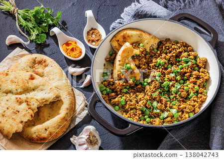 Indian keema matar with minced meat, peas and naan Indian keema matar with minced meat, peas and naan 138042743