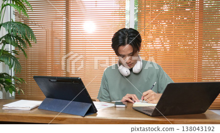 A young Asian couple spend time together at home A young Asian couple spend time together at home 138043192