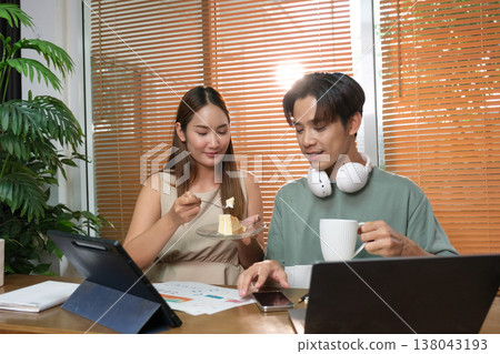 A young Asian couple spend time together at home A young Asian couple spend time together at home 138043193