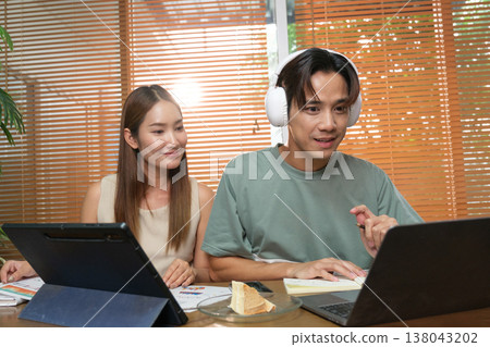 A young Asian couple spend time together at home A young Asian couple spend time together at home 138043202