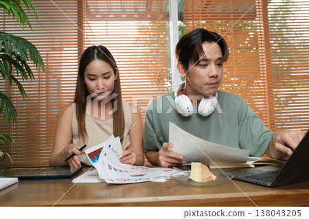 A young Asian couple spend time together at home A young Asian couple spend time together at home 138043205