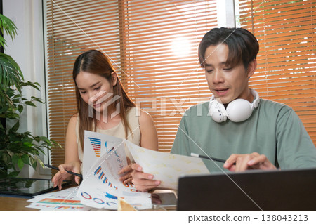 A young Asian couple spend time together at home A young Asian couple spend time together at home 138043213