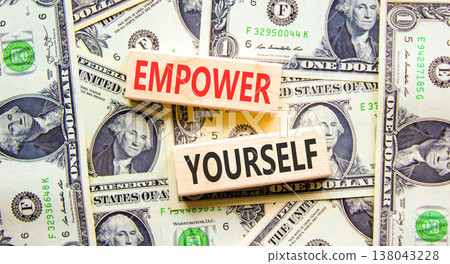 Empower yourself words symbol. Concept words Empower yourself on beautiful wooden blocks. Beautiful dollar bills background. Dollar bills. Business lifestyle Empower yourself words concept. Copy space Empower yourself words symbol. Concept words Empower yourself on beautiful wooden blocks. Beautiful dollar bills background. Dollar bills. Business lifestyle Empower yourself words concept. Copy space 138043228