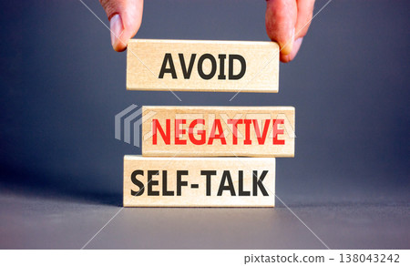 Avoid negative self-talk symbol. Concept words Avoid negative self-talk on beautiful wooden blocks. Beautiful grey background. Business psychology avoid negative self-talk concept. Copy space. Avoid negative self-talk symbol. Concept words Avoid negative self-talk on beautiful wooden blocks. Beautiful grey background. Business psychology avoid negative self-talk concept. Copy space. 138043242