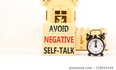 Avoid negative self-talk symbol. Concept words Avoid negative self-talk on beautiful wooden blocks. Beautiful white background. Business psychology avoid negative self-talk concept. Copy space. 138043244