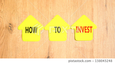 How to invest words symbol. Concept words How to invest on beautiful yellow paper houses. Beautiful wooden background. Business and how to invest concept. Copy space. How to invest words symbol. Concept words How to invest on beautiful yellow paper houses. Beautiful wooden background. Business and how to invest concept. Copy space. 138043248