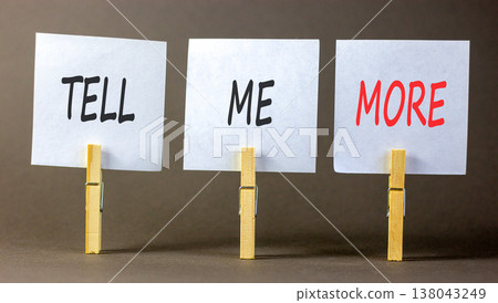 Tell me more words symbol. Concept words Tell me more on beautiful white papers on wooden clothespin. Beautiful grey background. Business and tell me more concept. Copy space. Tell me more words symbol. Concept words Tell me more on beautiful white papers on wooden clothespin. Beautiful grey background. Business and tell me more concept. Copy space. 138043249