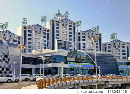 Ashgabat, Turkmenistan. September 21, 2021. Modern architecture of Ashgabat. New shopping mall "Ashgabat" . Ashgabat, Turkmenistan. September 21, 2021. Modern architecture of Ashgabat. New shopping mall "Ashgabat" . 138043416