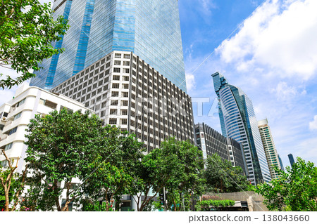 A cityscape with greenery and buildings 138043660