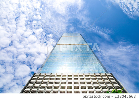 Landscape of the office town looking up at a skyscraper Landscape of the office town looking up at a skyscraper 138043668
