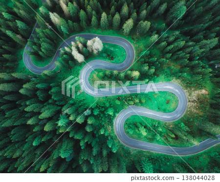 Aerial view of mountain snake road and green forest in summer Aerial view of mountain snake road and green forest in summer 138044028