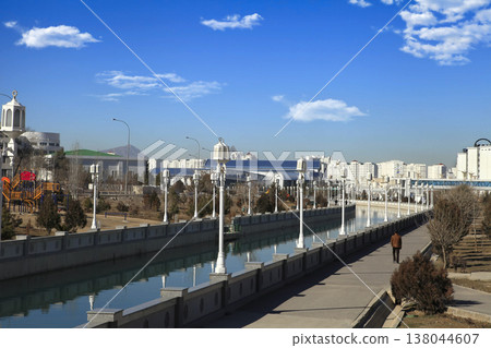ASHGABAT, TURKMENISTAN, January 25, 2022:  Modern architecture of Ashgabat. View of the water channel. ASHGABAT, TURKMENISTAN, January 25, 2022. 138044607