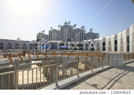 Ashgabat, Turkmenistan. September 21, 2021. Modern architecture of Ashgabat. New shopping mall "Ashgabat" . Ashgabat, Turkmenistan. September 21, 2021. Modern architecture of Ashgabat. New shopping mall "Ashgabat" . 138044625