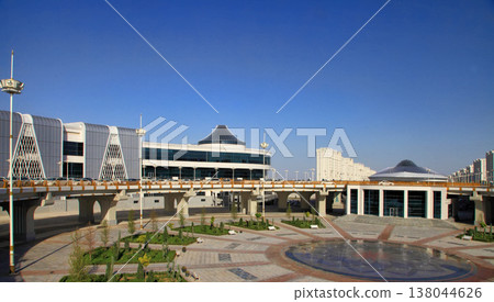 Ashgabat, Turkmenistan. September 21, 2021. Modern architecture of Ashgabat. New shopping mall "Ashgabat" . Ashgabat, Turkmenistan. September 21, 2021. Modern architecture of Ashgabat. New shopping mall "Ashgabat" . 138044626