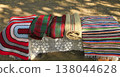 Homemade colorful woven rugs made of cotton threads. 138044628