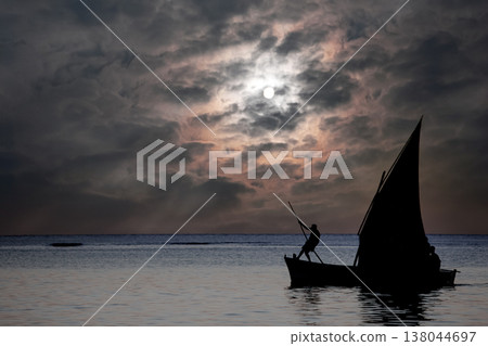sailboat at sunset in Mauritius island sailboat at sunset in Mauritius island 138044697
