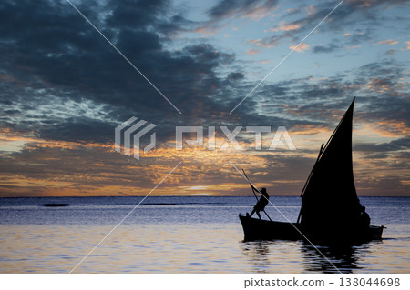 sailboat at sunset in Mauritius island sailboat at sunset in Mauritius island 138044698