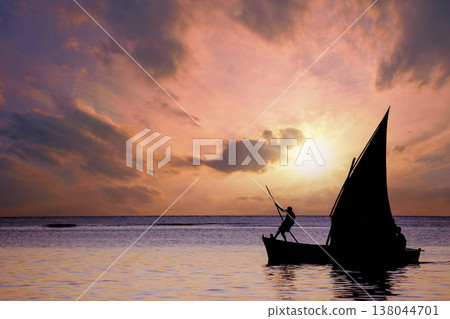sailboat at sunset in Mauritius island sailboat at sunset in Mauritius island 138044701