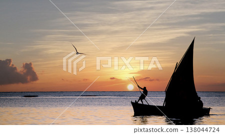 sailboat at sunset in Mauritius island sailboat at sunset in Mauritius island 138044724