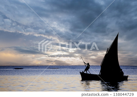 sailboat at sunset in Mauritius island sailboat at sunset in Mauritius island 138044729