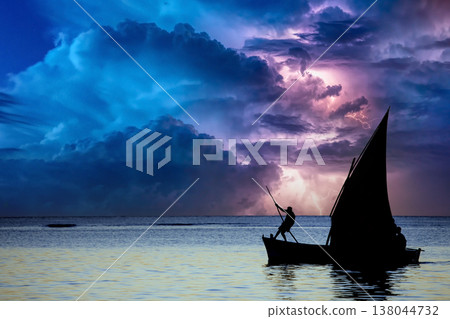 sailboat at sunset in Mauritius island sailboat at sunset in Mauritius island 138044732