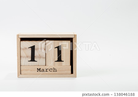 Wooden calendar March 11 on a white background Wooden calendar March 11 on a white background 138046188