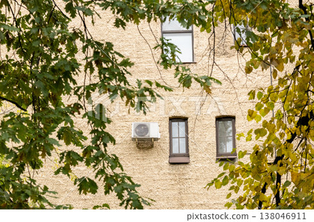 air conditioning on facade of building, air cooling in hot weather.  138046911